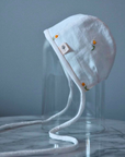 Daisy Linen Brimless Bonnet